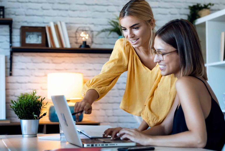 two-freelance-business-women-in-their-startup-small-business-.jpg